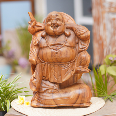 Wood sculpture, 'Traveling Buddha' - Hand-Carved Suar Wood Sculpture of Buddha from Bali