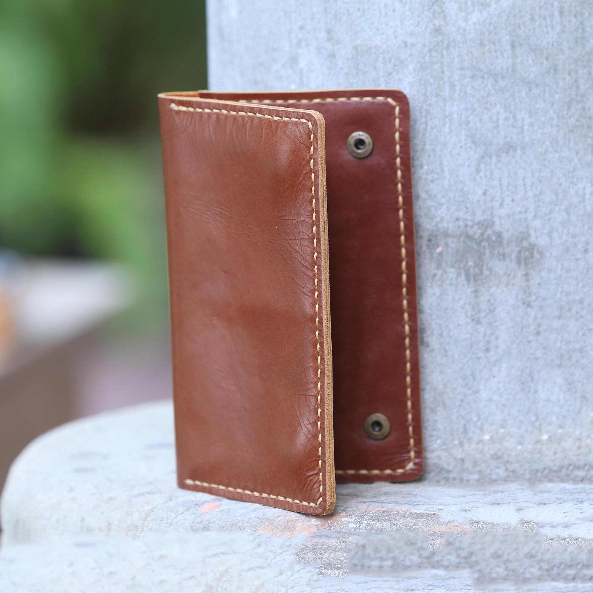 unicef-market-medium-brown-leather-snap-closure-bi-fold-passport