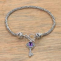 Amethyst charm bracelet, 'Beauty Unlocked' - Handcrafted Amethyst and Sterling Silver Key Charm Bracelet
