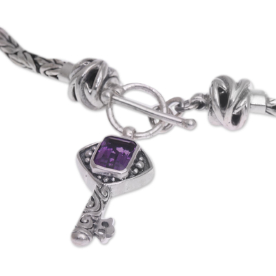 Amethyst charm bracelet, 'Beauty Unlocked' - Handcrafted Amethyst and Sterling Silver Key Charm Bracelet