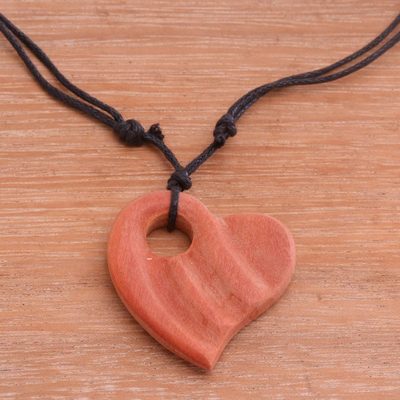 Wood pendant necklace, 'Wavy Heart' - Sawo Wood Heart-Shaped Pendant Necklace from Bali