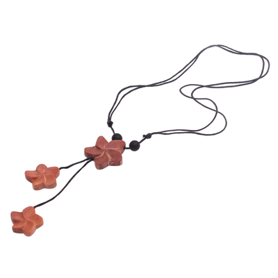 Wood pendant necklace, 'Three Jepuns' - Sawo Wood Frangipani Flower Pendant Necklace from Bali