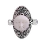 Blue topaz cocktail ring, 'Tranquil in Blue' - Carved Cow Bone Sterling Silver Blue Topaz Cocktail Ring