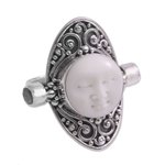 Blue topaz cocktail ring, 'Tranquil in Blue' - Carved Cow Bone Sterling Silver Blue Topaz Cocktail Ring