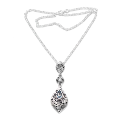 Blue topaz pendant necklace, 'Tari Lotus' - Floral Blue Topaz Pendant Necklace from Bali