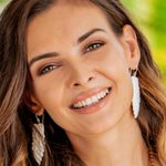 Bone dangle earrings, 'Sibetan Woman' - Bone Dangle Earrings of a Sibetan Woman from Bali