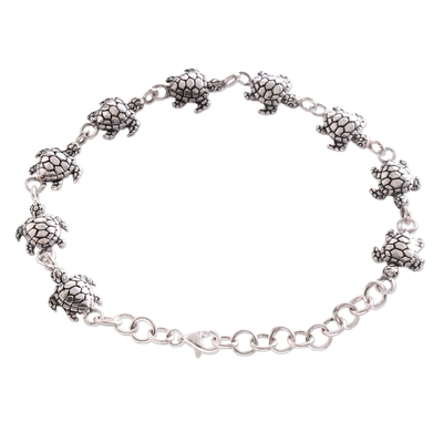 Sterling silver link bracelet, 'Turtle Promenade' - Handcrafted Sterling Silver Turtle Link Bracelet from Bali