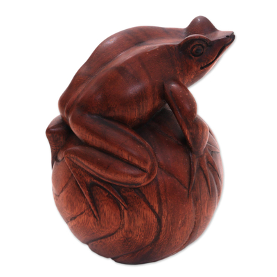Wood figurine, 'Frog on a Ball' - Hand-Carved Suar Wood Frog Figurine from Bali
