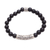 Onyx beaded stretch bracelet, 'Batuan Wangi' - Onyx Beaded Stretch Pendant Bracelet from Bali