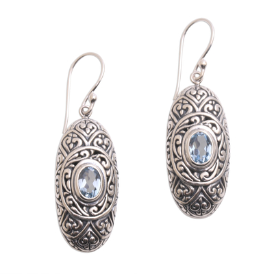 Blue topaz dangle earrings, 'My Protector in Blue' - Blue Topaz and Sterling Silver Dangle Earrings from Bali