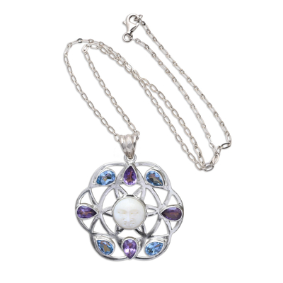 Blue topaz and amethyst pendant necklace, 'Matahari' - Blue Topaz and Amethyst Sun Face Pendant Necklace from Bali