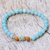 Gold accented amazonite beaded stretch bracelet, 'Batuan Tune' - Gold Accented Amazonite Beaded Stretch Bracelet from Bali