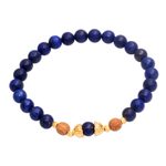 Gold accented lapis lazuli beaded stretch bracelet, 'Batuan Tune' - Gold Accented Lapis Lazuli Beaded Stretch Bracelet from Bali