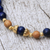 Gold accented lapis lazuli beaded stretch bracelet, 'Batuan Tune' - Gold Accented Lapis Lazuli Beaded Stretch Bracelet from Bali (image 2c) thumbail