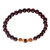 Gold accented garnet beaded stretch bracelet, 'Batuan Tune' - Gold Accented Garnet Beaded Stretch Bracelet from Bali