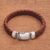 Men's leather braided wristband bracelet, 'Braided Brawn' - Men Braided Brown Leather Sterling Silver Wristband Bracelet