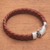 Men's leather braided wristband bracelet, 'Braided Brawn' - Men Braided Brown Leather Sterling Silver Wristband Bracelet