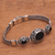 Onyx pendant bracelet, 'Garden Glow' - Floral Black Onyx Pendant Bracelet from Bali