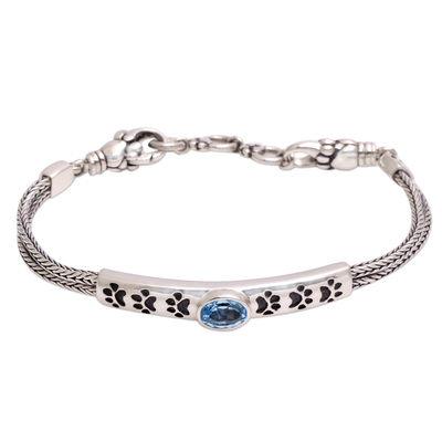 Blue topaz pendant bracelet, 'Paw Power' - Paw Print Blue Topaz Pendant Bracelet from Bali