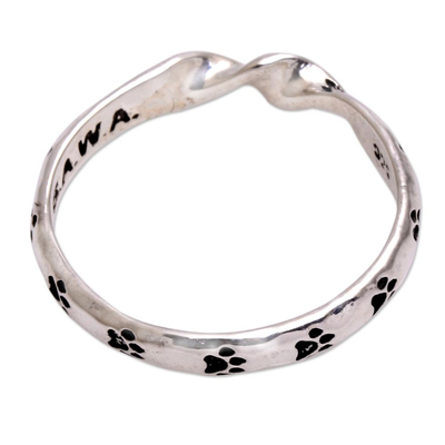 Sterling silver band ring, 'Animal Twist' - Sterling Silver Band Ring with Paw Print Motifs from Bali