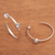 Blue topaz half-hoop earrings, 'Pretty Paradox' - Sterling Silver Hammered Blue Topaz Half-Hoop Earrings (image 2b) thumbail