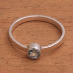 Blue topaz solitaire ring, 'Pretty Paradox' - Blue Topaz and Hammered Sterling Silver Solitaire Ring