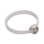 Blue topaz solitaire ring, 'Pretty Paradox' - Blue Topaz and Hammered Sterling Silver Solitaire Ring