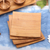 Teak wood plates, 'Fine Meal' (set of 4) - Handmade Square Teak Wood Plates from Bali (Set of 4) thumbail