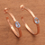 Rose gold plated blue topaz half hoop earrings, 'Paradox' - Rose Gold Plated Blue Topaz Hammered Half Hoop Earrings (image 2) thumbail