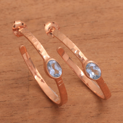 Rose gold plated blue topaz half hoop earrings, 'Paradox' - Rose Gold Plated Blue Topaz Hammered Half Hoop Earrings