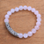Rose quartz beaded stretch bracelet, 'Rosy Arch' - Rose Quartz Beaded Stretch Bracelet from Bali