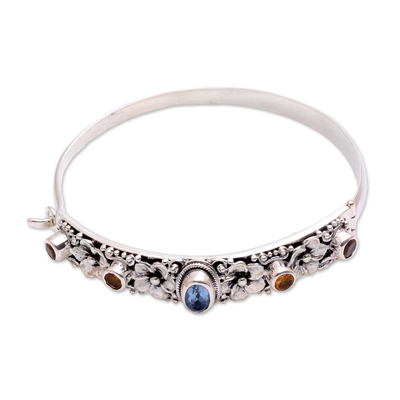 Blue topaz and citrine bangle bracelet, 'Jepun Dynasty' - Blue Topaz and Citrine Bangle Bracelet from Bali
