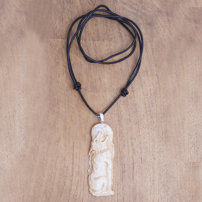 Bone pendant necklace, 'Wolf Howl' - Wolf-Themed Bone Pendant Necklace from Bali