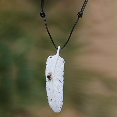 Garnet and bone pendant necklace, 'Feather Soul' - Garnet Leather and Carved Bone Feather Pendant Necklace