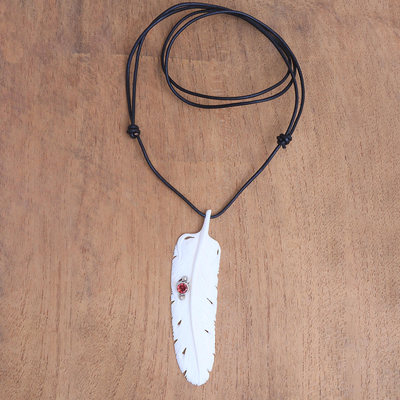 Garnet and bone pendant necklace, 'Feather Soul' - Garnet Leather and Carved Bone Feather Pendant Necklace