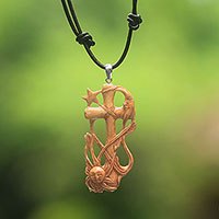 Bone pendant necklace, 'Faithful Sun and Moon'