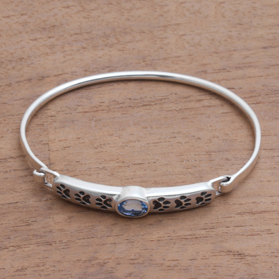 Blue topaz pendant bracelet, 'Cute Paw Prints' - Animal-Themed Blue Topaz Pendant Bracelet from Bali