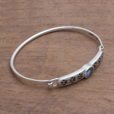 Blue topaz pendant bracelet, 'Cute Paw Prints' - Animal-Themed Blue Topaz Pendant Bracelet from Bali
