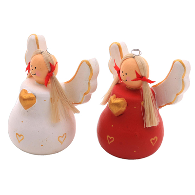 Wood statuettes, 'Heart Angels' (pair) - Red and White Wood Angel Statuettes from Bali (Pair)