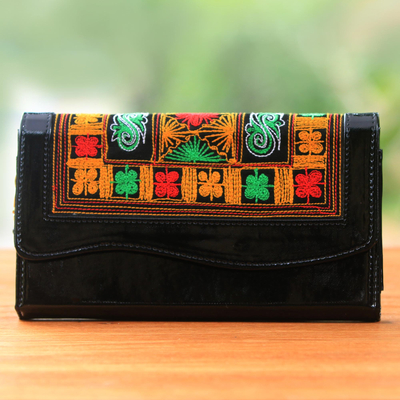 Cotton accent clutch, 'Hulumasen in Black' - Handwoven Black and Orange Floral Clutch with Strap