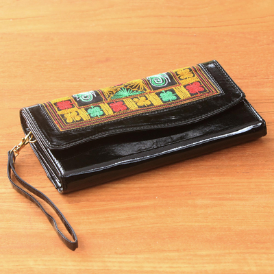 Cotton accent clutch, 'Hulumasen in Black' - Handwoven Black and Orange Floral Clutch with Strap