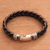Men's leather braided wristband bracelet, 'Earth Braid' - Men's Leather and Sterling Silver Braided Bracelet thumbail