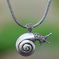 Blue topaz pendant necklace, 'Bunaken Snail' - Blue Topaz Snail Pendant Necklace from Java