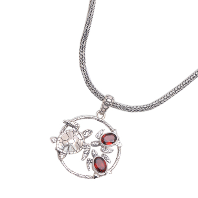 Garnet pendant necklace, 'Sea Turtle Family' - Garnet Sea Turtle Pendant Necklace from Bali
