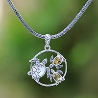 Citrine pendant necklace, 'Sea Turtle Family' - Citrine Sea Turtle Pendant Necklace from Bali