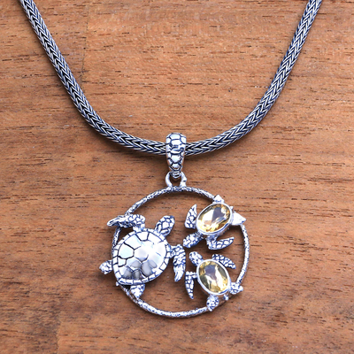 Citrine pendant necklace, 'Sea Turtle Family' - Citrine Sea Turtle Pendant Necklace from Bali