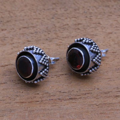 Garnet stud earrings, 'Eye of the Snake' - Sparkling Garnet Stud Earrings from Bali
