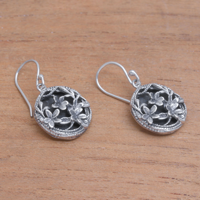 Sterling silver dangle earrings, 'Private Garden' - Frangipani Flower Sterling Silver Dangle Earrings from Bali