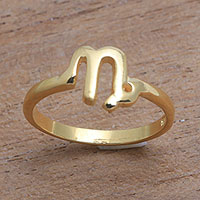 Gold plated sterling silver band ring, 'Golden Capricorn'