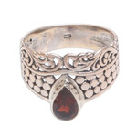 Garnet cocktail ring, 'Temple Stones' - Circle Motif Garnet Cocktail Ring from Bali
